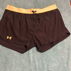 Black and yellow Under Armour athletic shorts. Size large, loose.